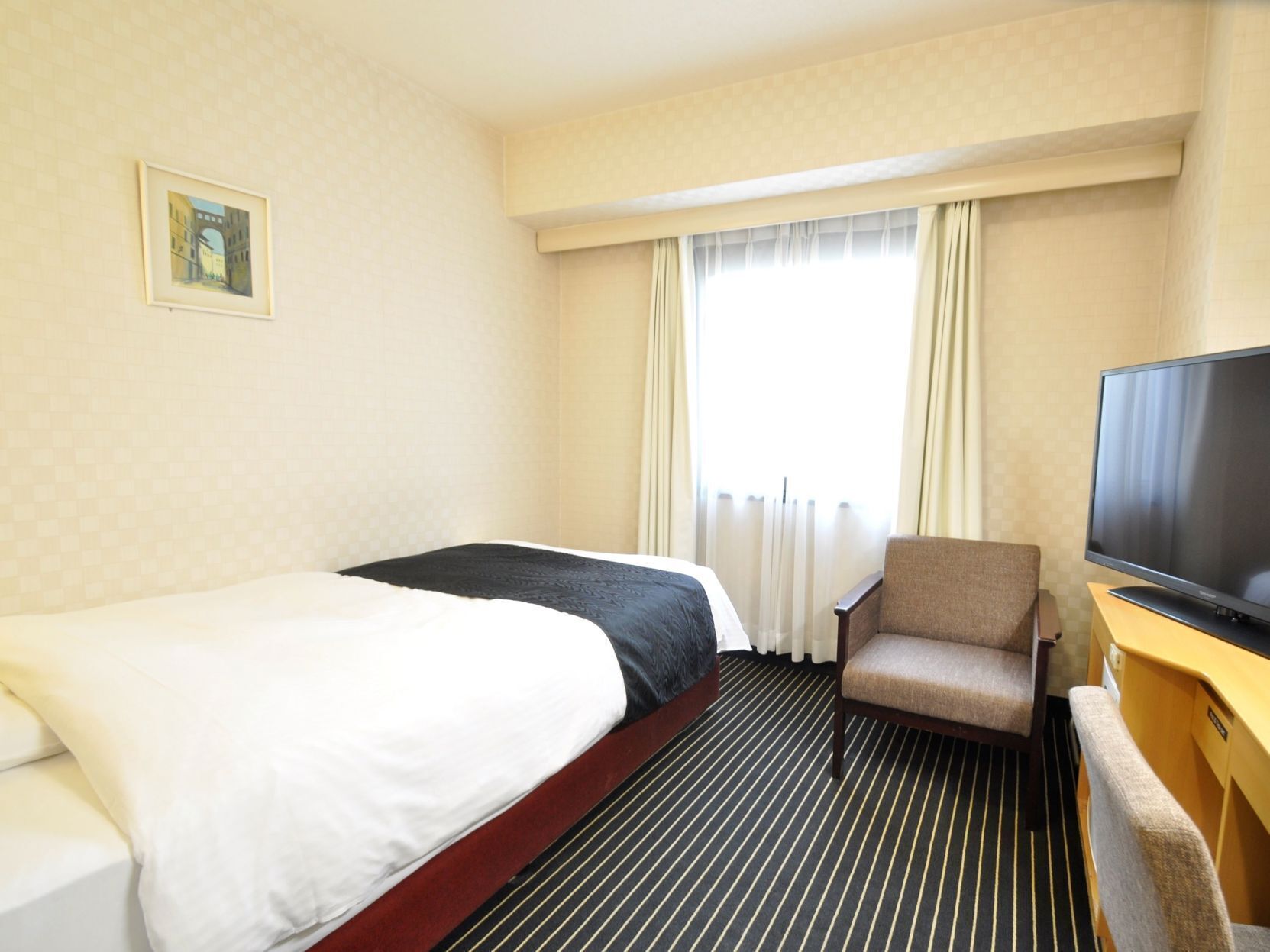 Down comforters, memory foam beds, desk, blackout drapes