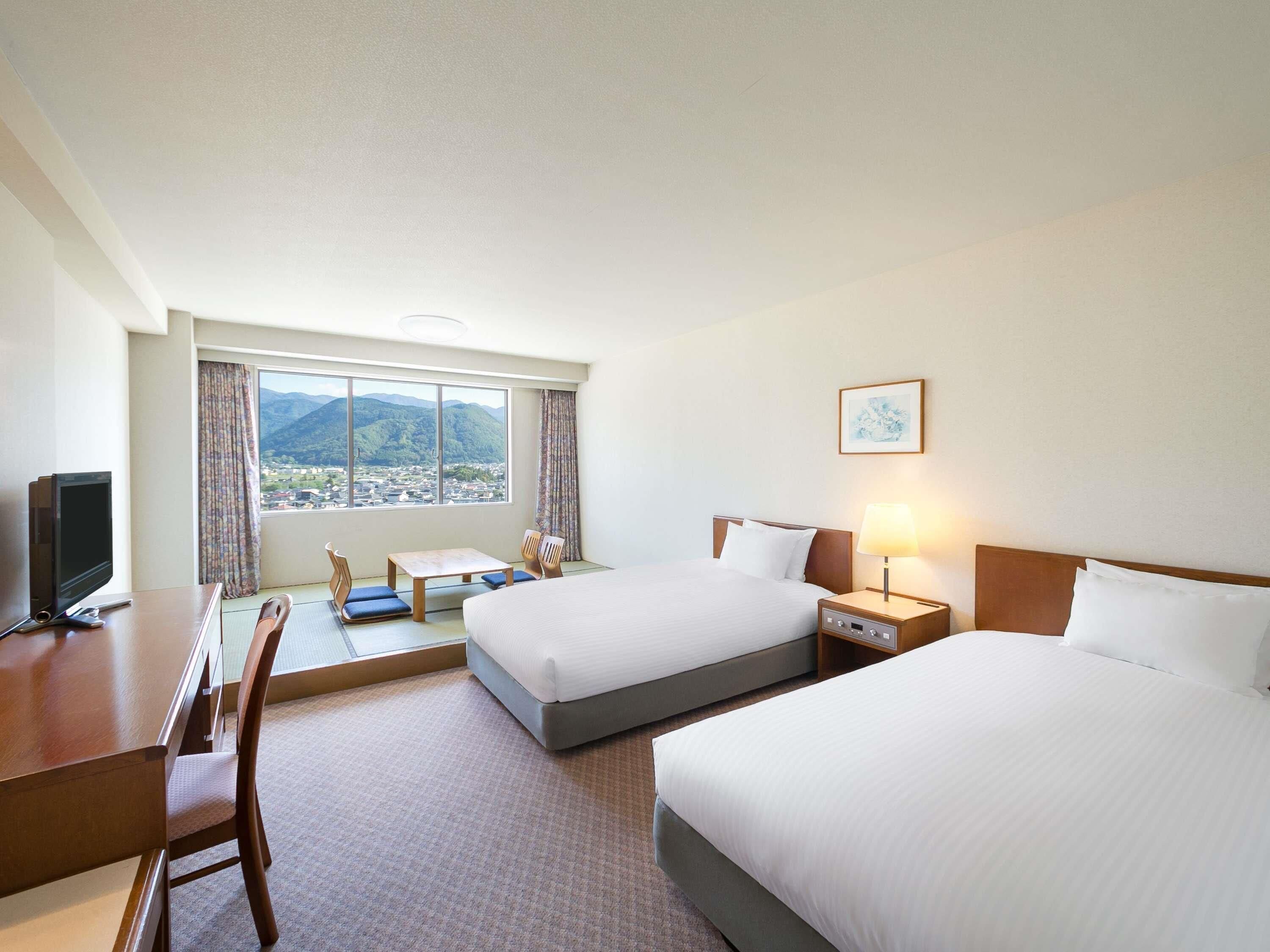 Classic Room, Japanese style, 2 single beds and 2 futon beds, Mountain view | In-room safe, desk, iron/ironing board, free WiFi