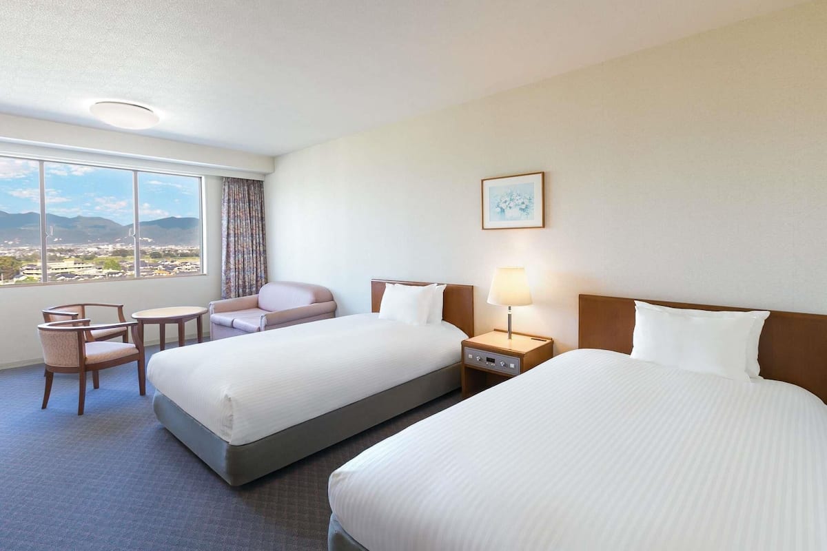 Classic Room with 2 single beds and 1 sofa bed, Mountain view