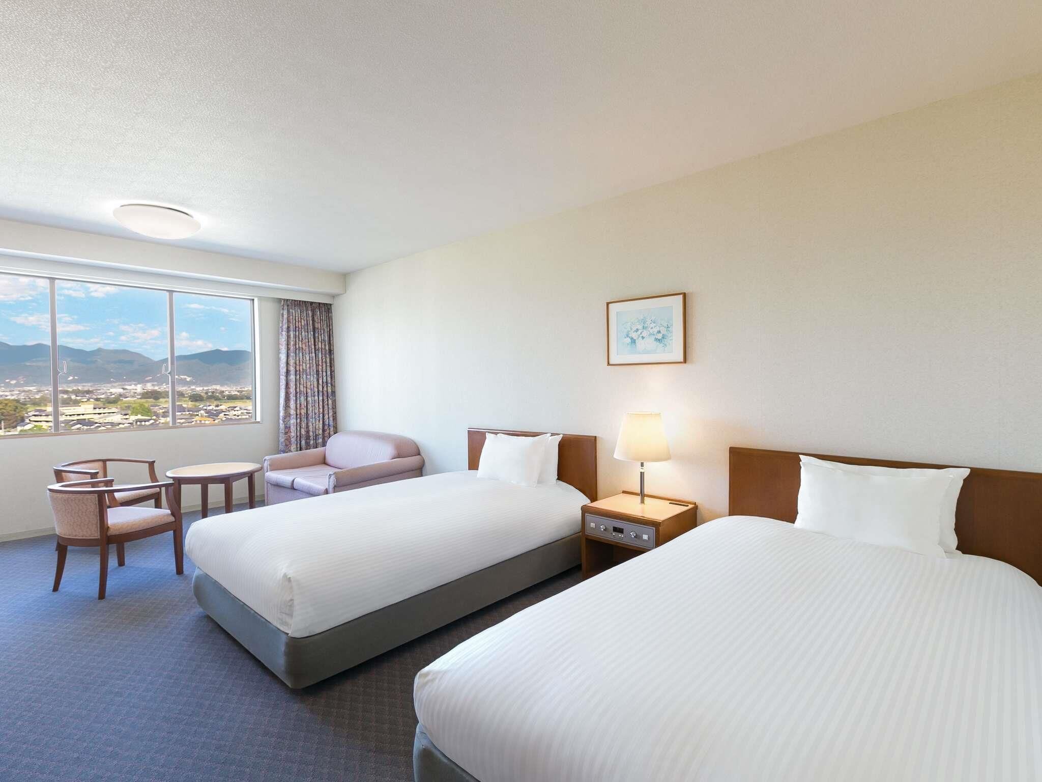 Classic Room with 2 single beds and 1 sofa bed, Mountain view