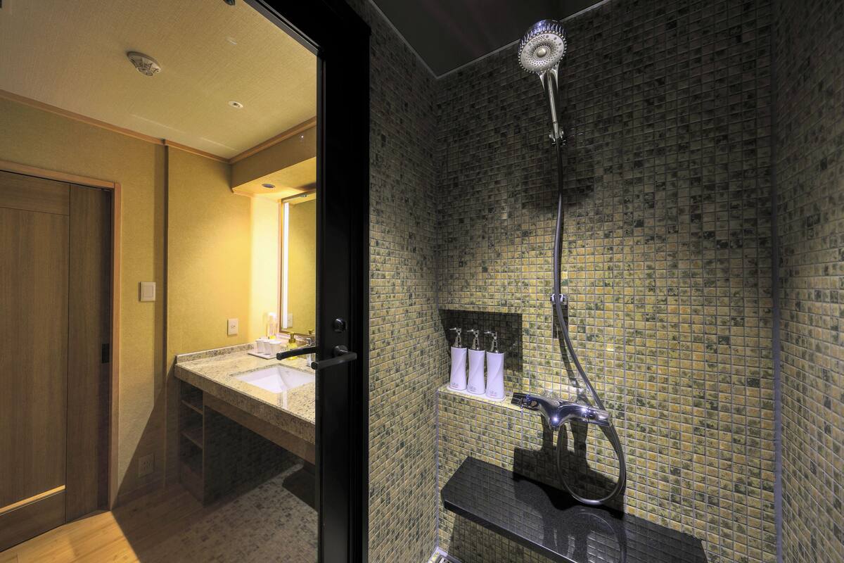 suite with spa bath, non smoking | bathroom | hair dryer, slippers, electronic bidet, towels
