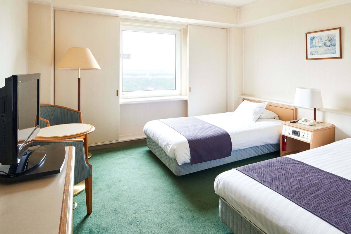 Down duvets, desk, blackout curtains, cots/infant beds