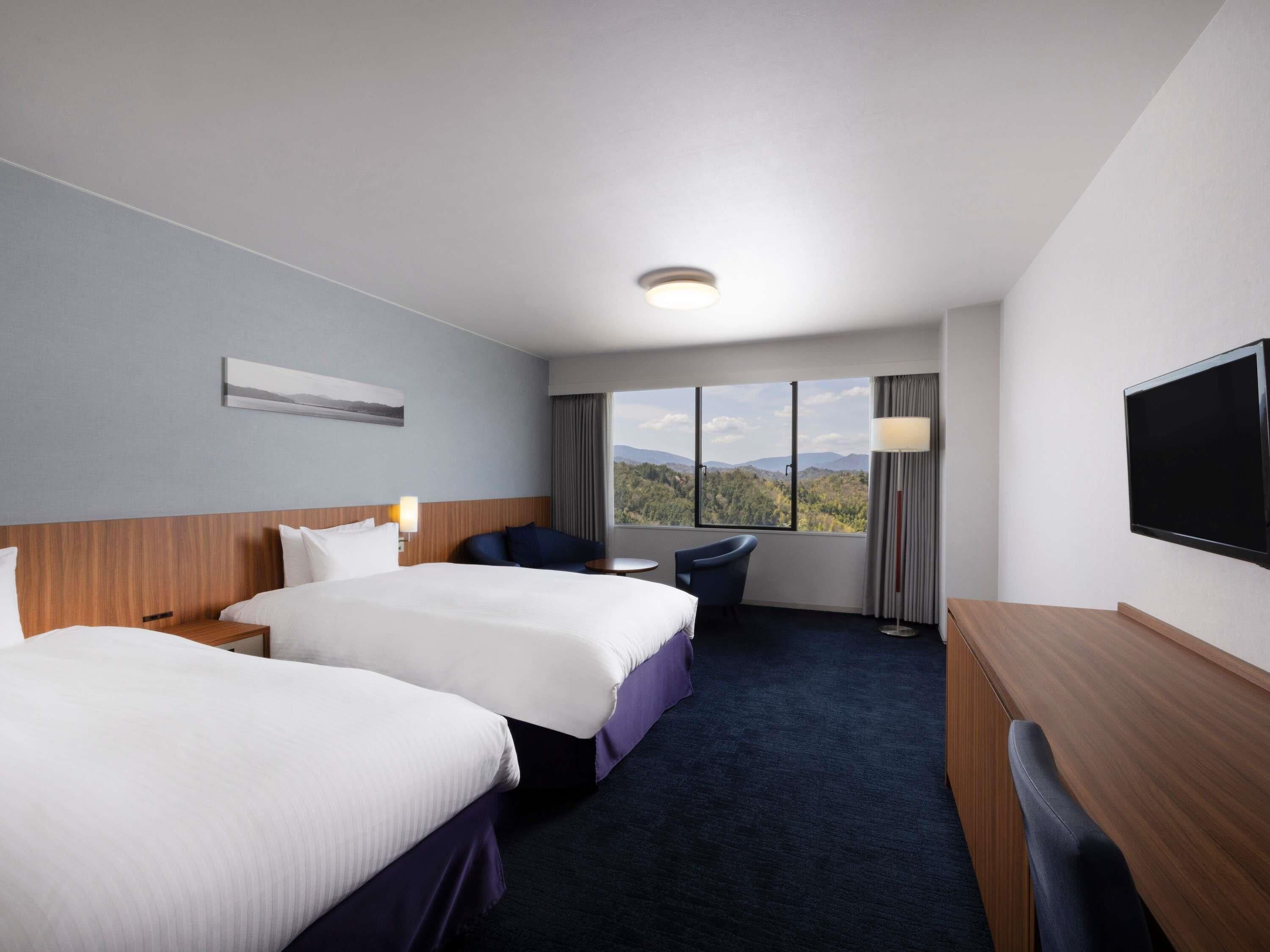 Privilege, Habitación, 2 camas individuales, vista al mar | Caja de seguridad en la habitación, escritorio y wifi gratis 