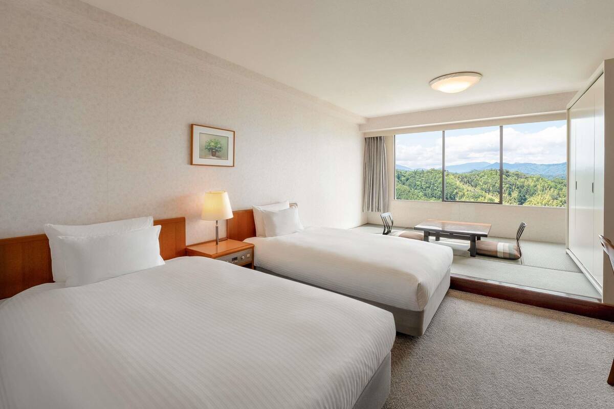 Classic Room, 2 Twin Beds and 2 Futon Beds, Ocean/Sea View (Japanese Western Style) | In-room safe, desk, free WiFi, bed sheets