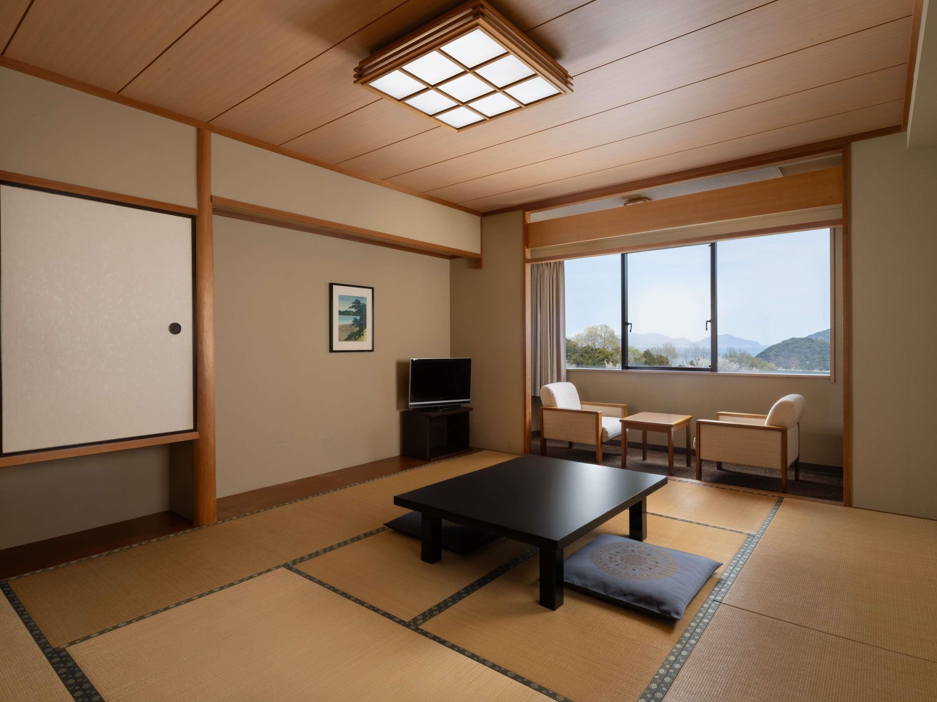 Habitación clásica, 3 camas individuales, vista al mar (Japanese Style) | Caja de seguridad en la habitación, escritorio y wifi gratis 