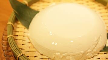 A round, white object on a woven basket.