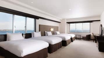 Deluxe Suite, Multiple Beds, Sea View | In-room safe, desk, free WiFi, bed sheets