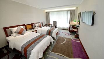 Premium bedding, down comforters, minibar, desk