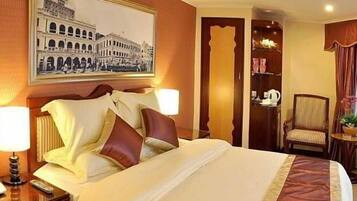 Premium bedding, down comforters, minibar, desk