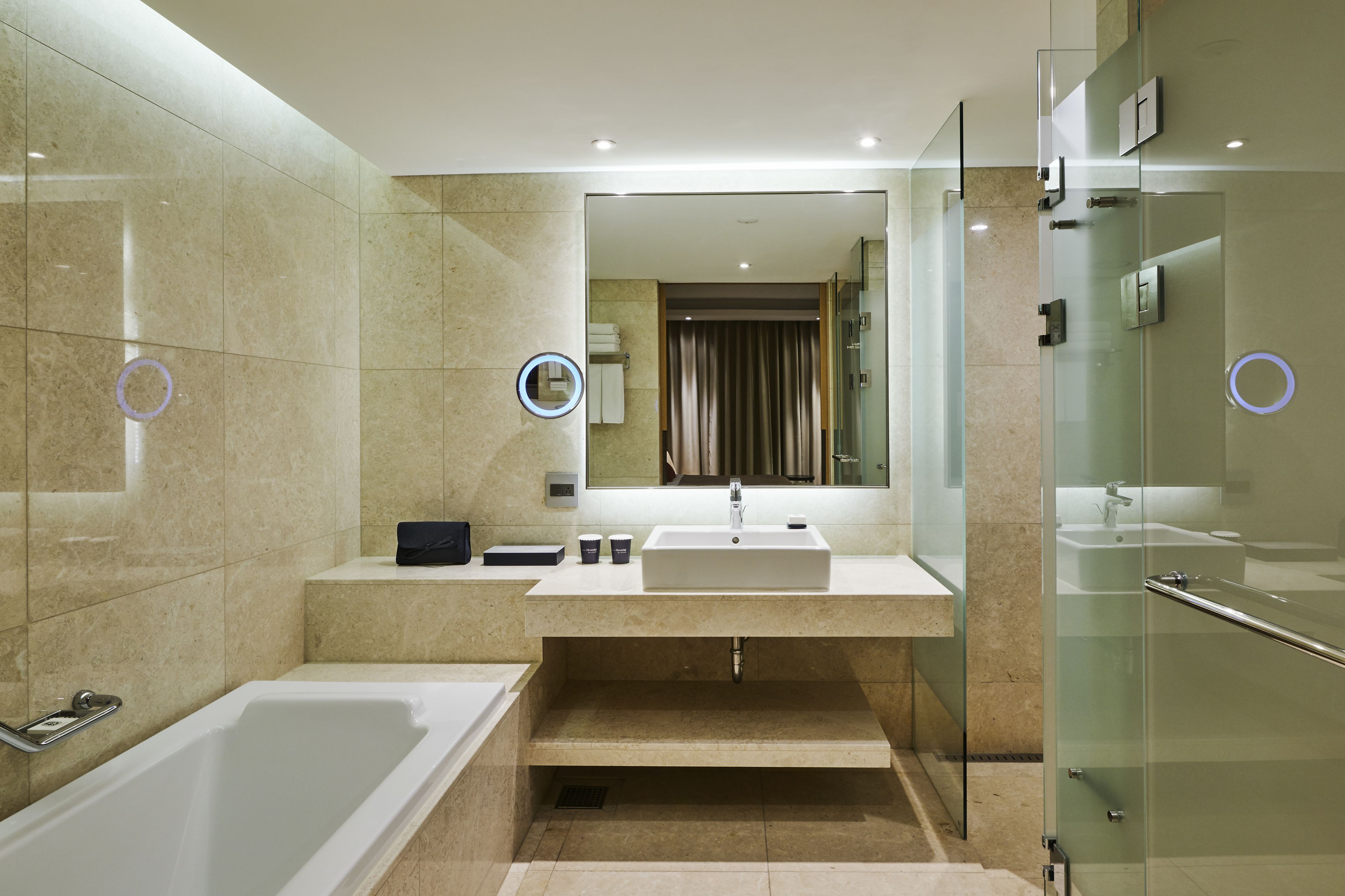 studio suite (indoor pool access for 2) | bathroom | hair dryer, bathrobes, slippers, towels