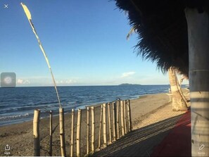 Private beach, black sand, beach towels, beach bar