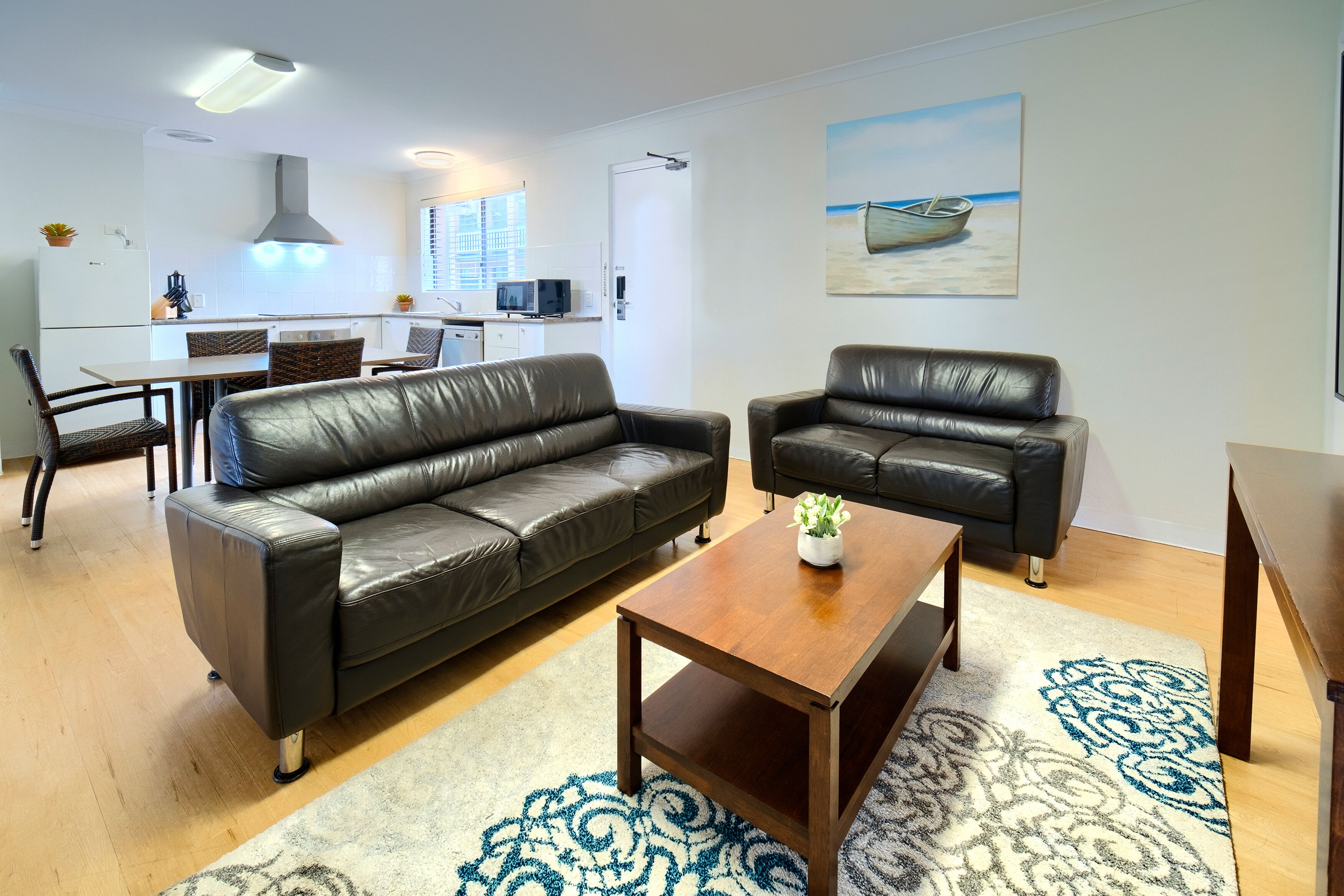 Apartamento, 3 quartos | Área de estar