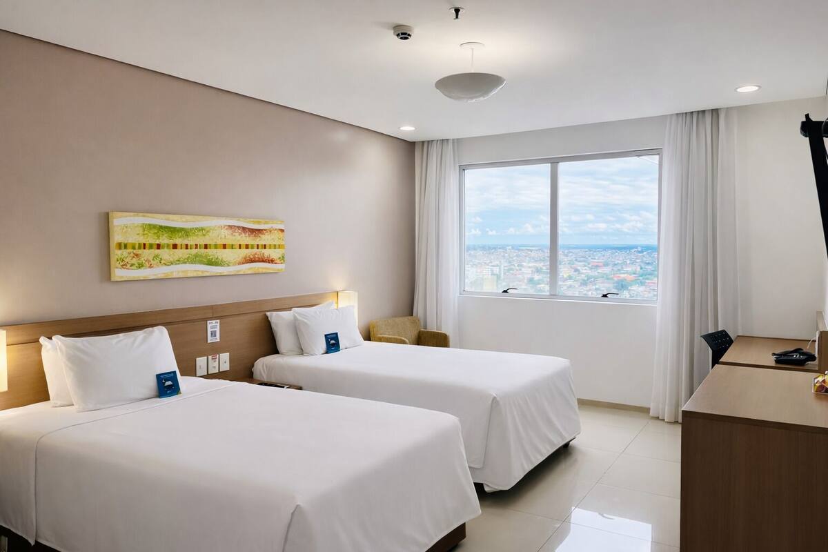 Habitación Deluxe con 2 camas individuales | Minibar, caja fuerte, escritorio y wifi gratis