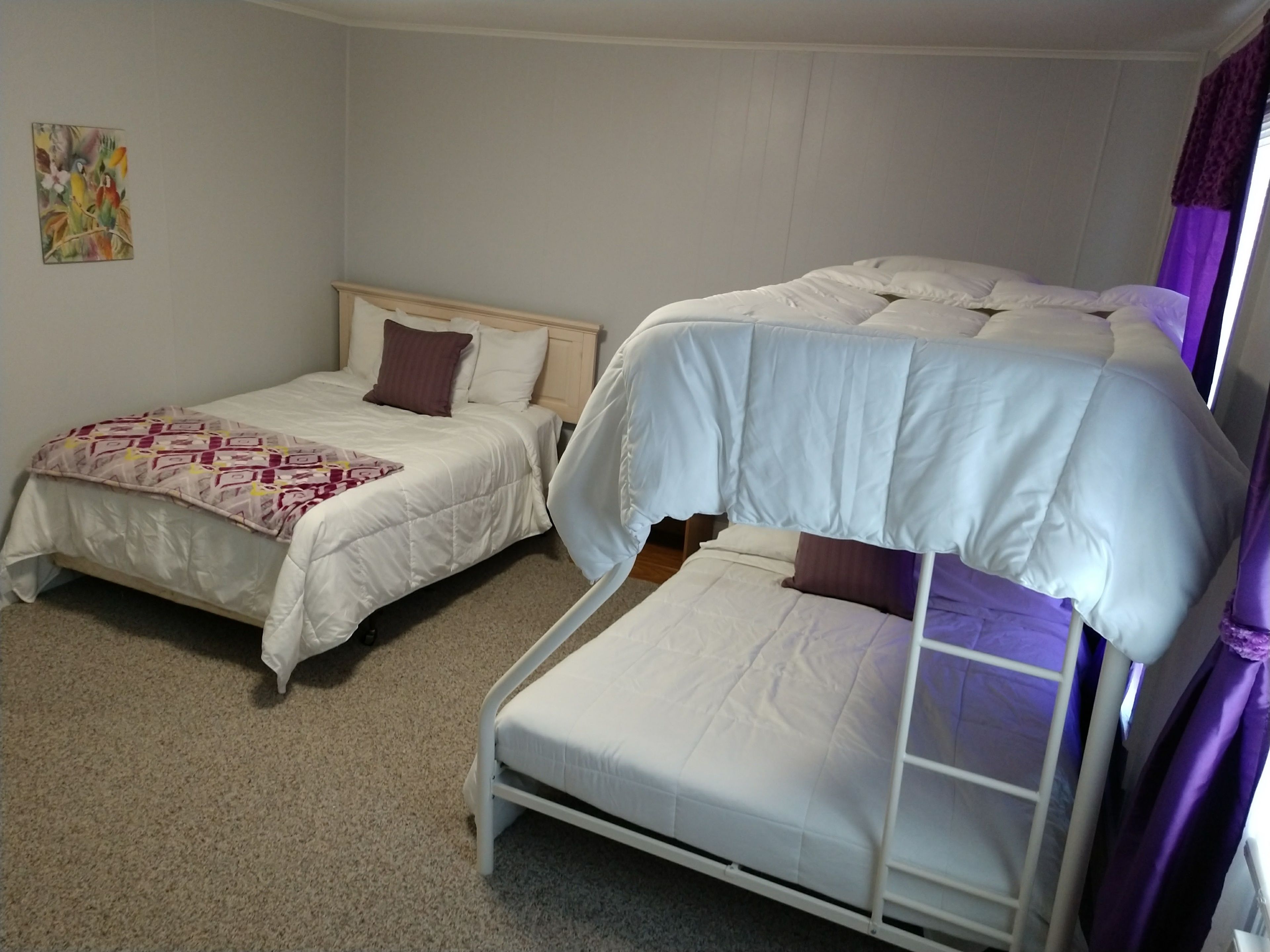 Deluxe Apartment, 2 Bedrooms | Pillow-top beds, desk, iron/ironing board, free WiFi