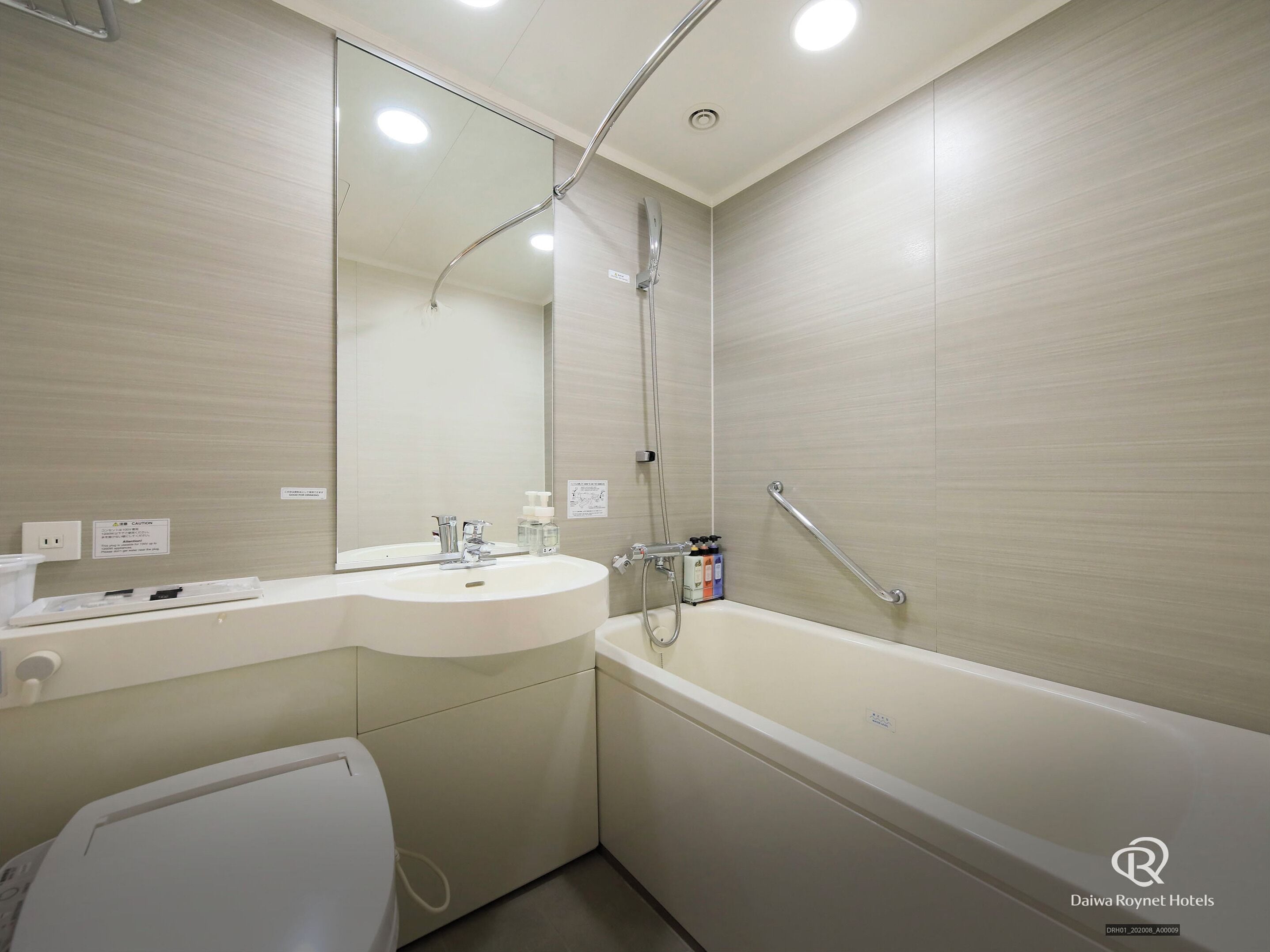 combined shower/bathtub, free toiletries, hair dryer, slippers