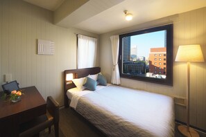 Down comforters, desk, blackout drapes, iron/ironing board