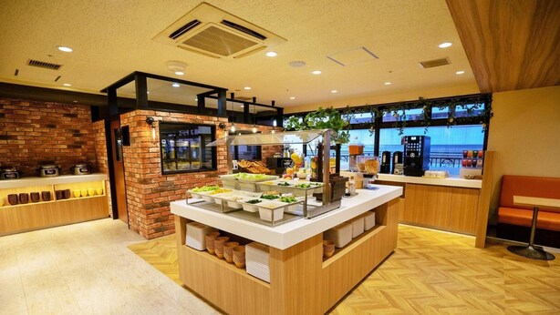 A breakfast buffet with various food items and a coffee station. - Yokohama Heiwa Plaza Hotel (Yokohama)