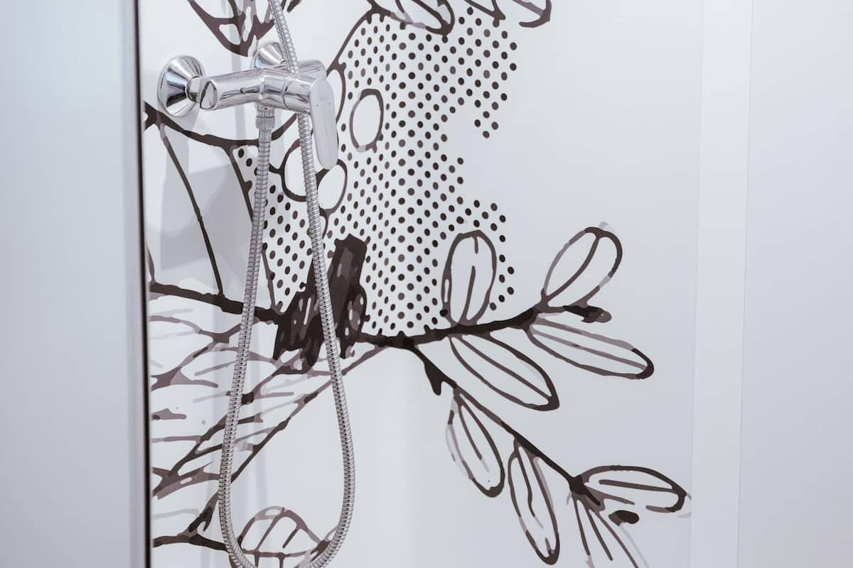 hydromassage showerhead, eco-friendly toiletries, towels, soap