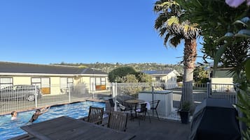 Seasonal outdoor pool, pool umbrellas