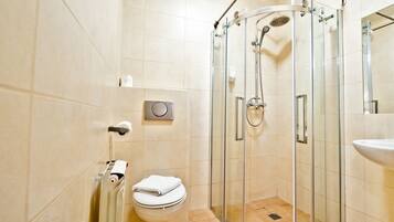 Shower, rainfall showerhead, hair dryer, towels