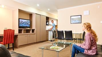 Family Apartment, 2 Bedrooms | Living area | 32-inch LCD TV with digital channels, TV