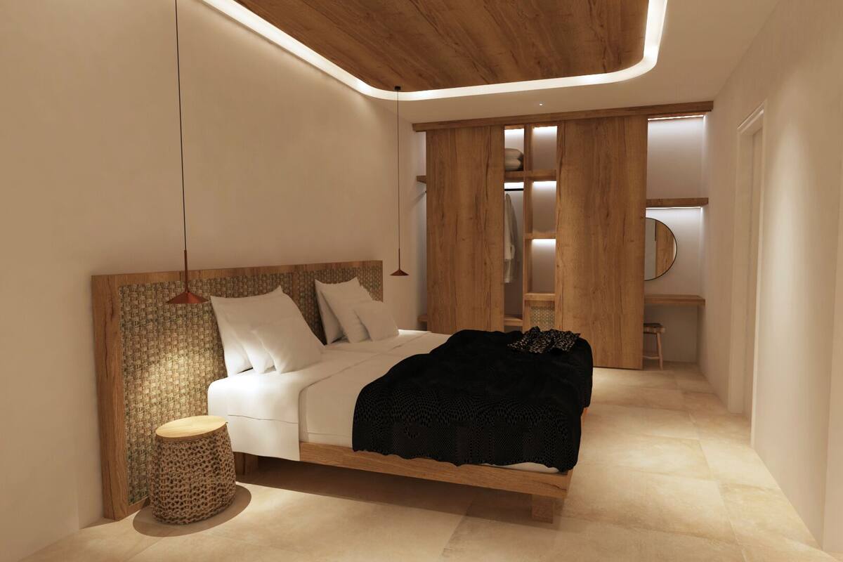 Une chambre à coucher moderne avec un lit, une table de chevet et une armoire.