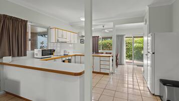Standard Villa, 3 Bedrooms | Private kitchen | Full-sized fridge, microwave, stovetop, coffee/tea maker