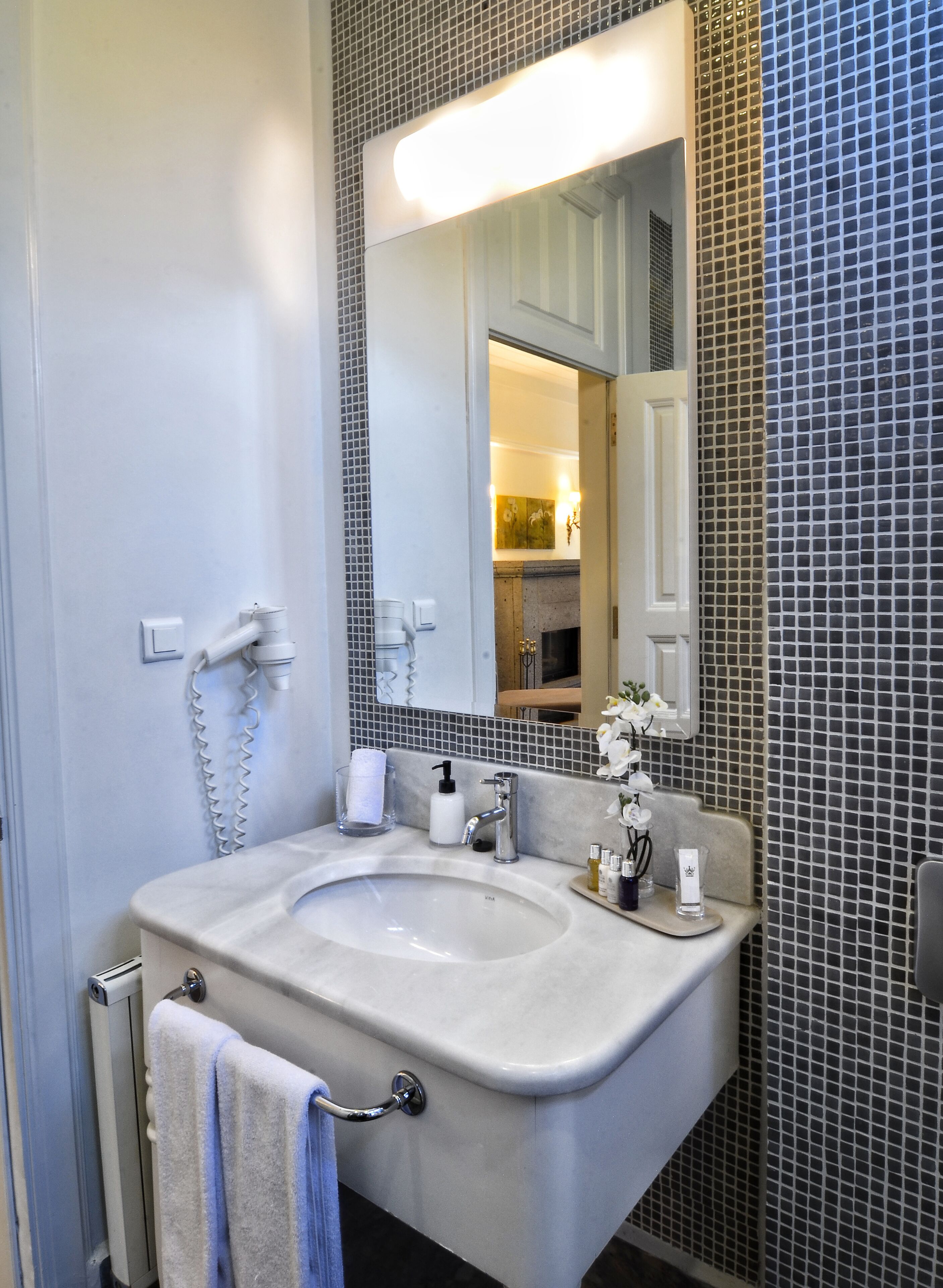 luxury room | bathroom | shower, hair dryer, slippers, towels