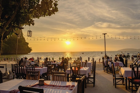 Breakfast, lunch, dinner served; beach views. Sand Sea Resort