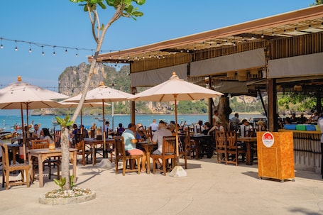 Breakfast, lunch, dinner served; beach views. Sand Sea Resort