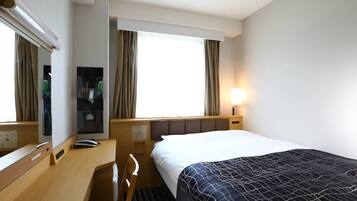 Down comforters, desk, free WiFi, bed sheets