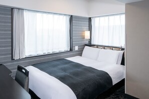Habitación doble, no fumadores | Edredones de plumas, escritorio, cortinas opacas