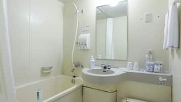 Combined shower/bathtub, designer toiletries, hair dryer, bathrobes