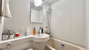 Combined shower/tub, deep soaking tub, free toiletries, hair dryer