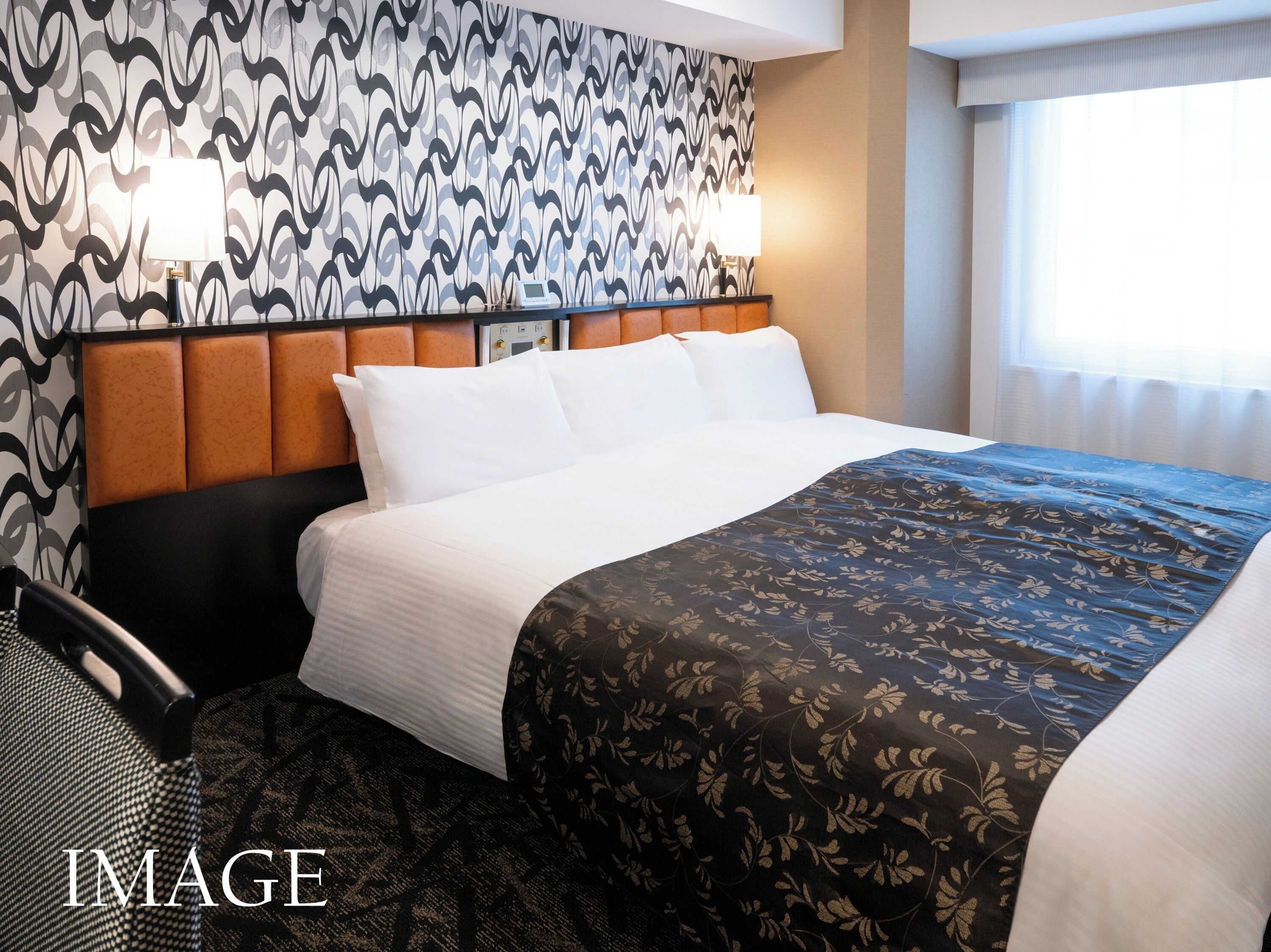 Down comforters, desk, blackout drapes, iron/ironing board