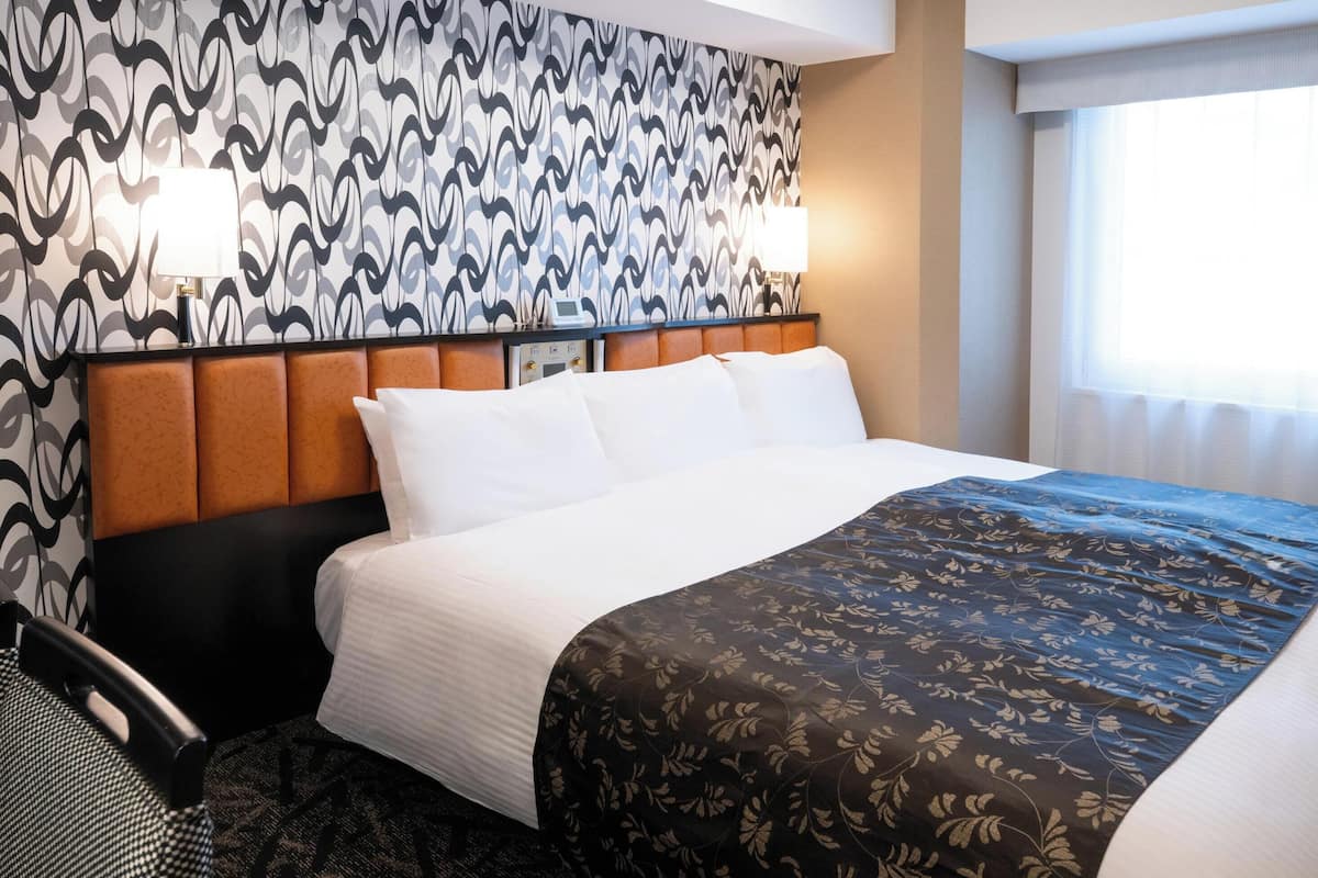 Down duvets, desk, blackout curtains, iron/ironing board