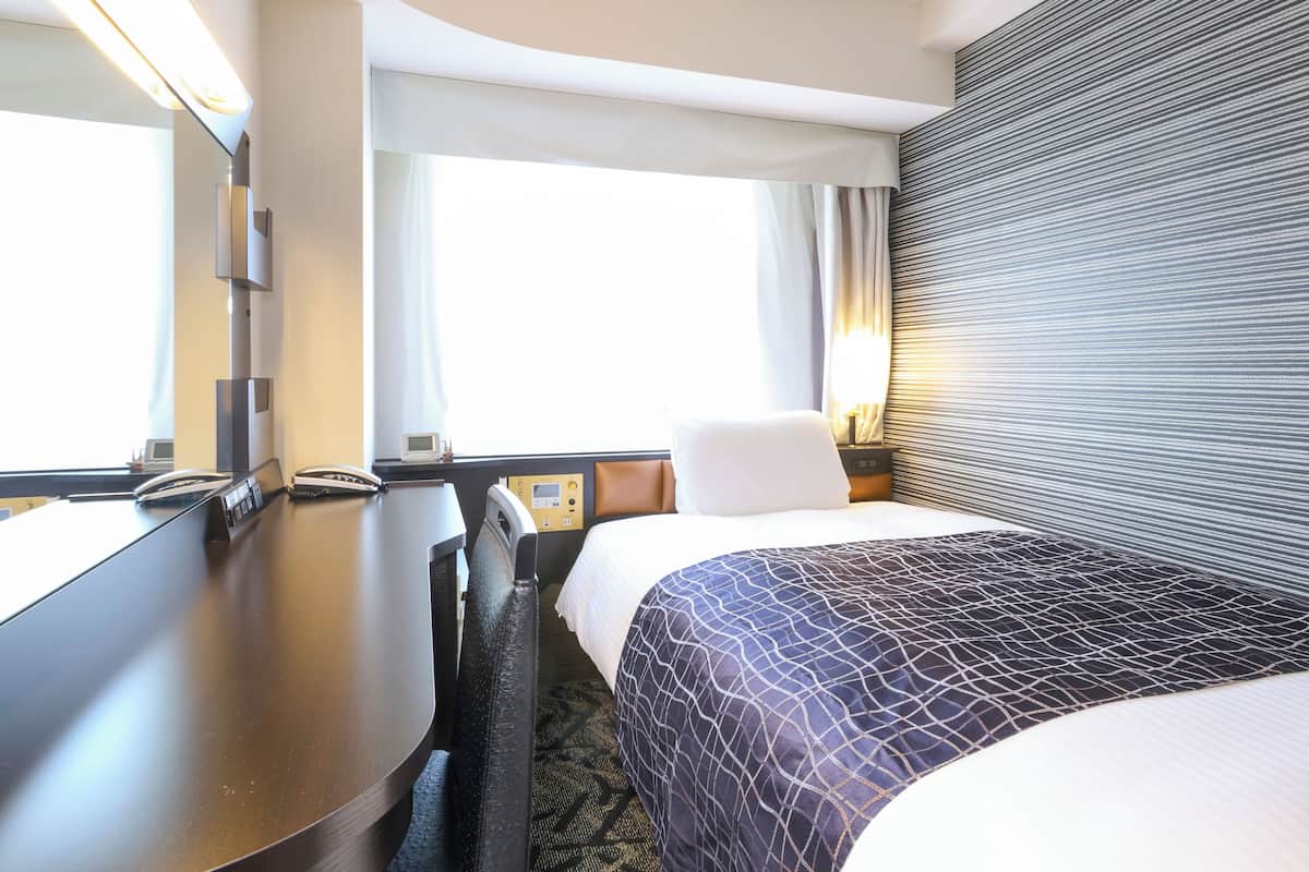 Down duvets, desk, blackout curtains, iron/ironing board