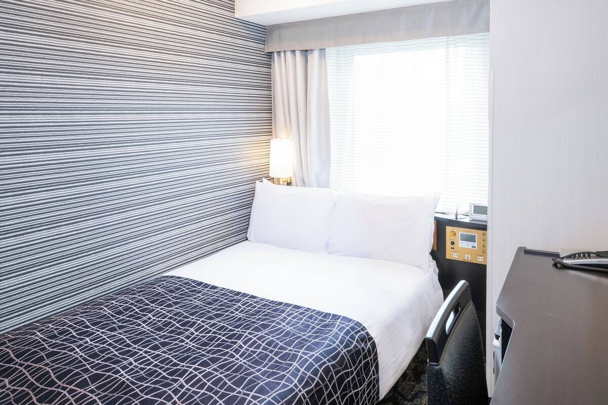 Down duvets, desk, blackout curtains, iron/ironing board (on request)