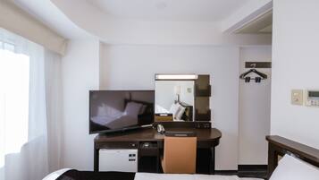 Down duvets, desk, blackout curtains, iron/ironing board