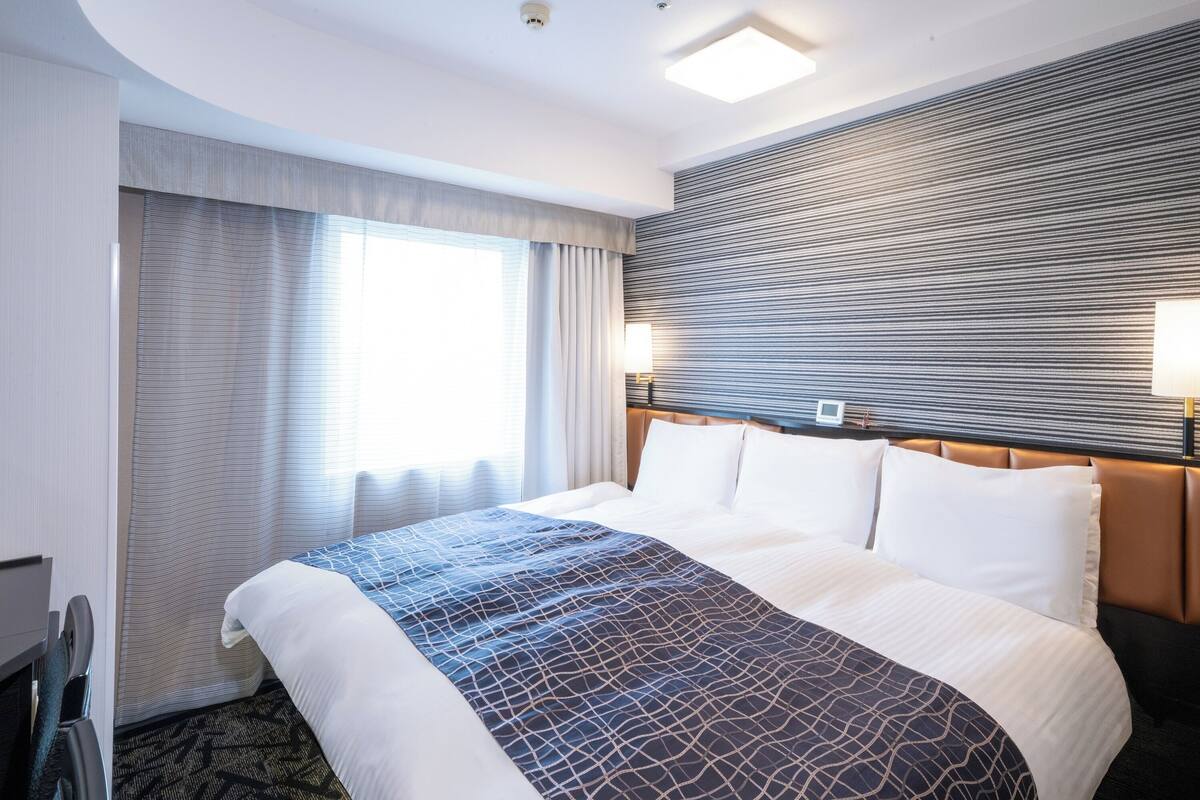 Family Twin Room, 1 King Bed, Non Smoking | Down duvets, desk, blackout curtains, iron/ironing board (on request)