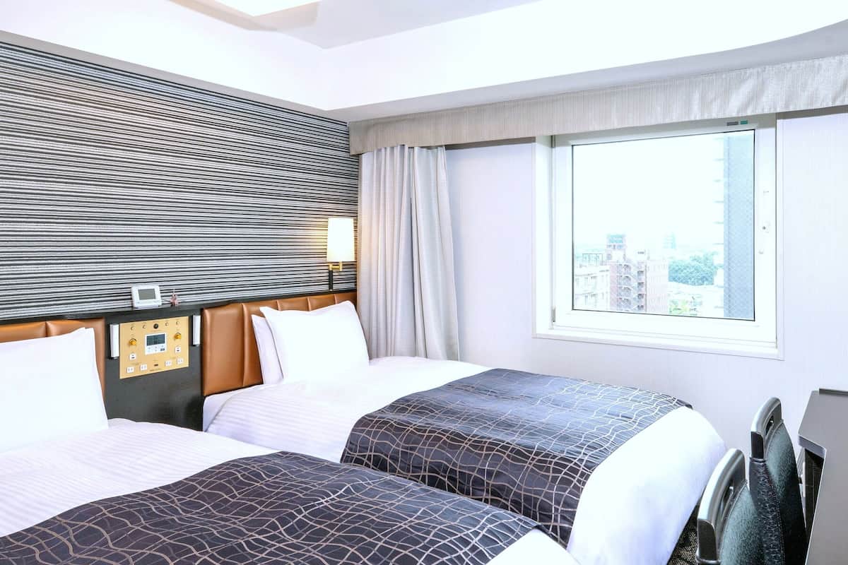 Down duvets, desk, blackout curtains, iron/ironing board (on request)