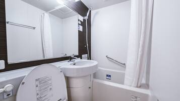 Combined shower/tub, deep soaking tub, free toiletries, hair dryer