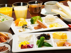 A meal tray with various dishes including rice, vegetables, and a small bowl of lentils. - APA Hotel Osaka Temma (Osaka)