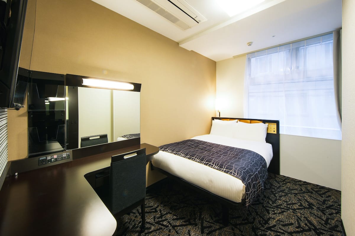 Desk, blackout curtains, iron/ironing board, WiFi