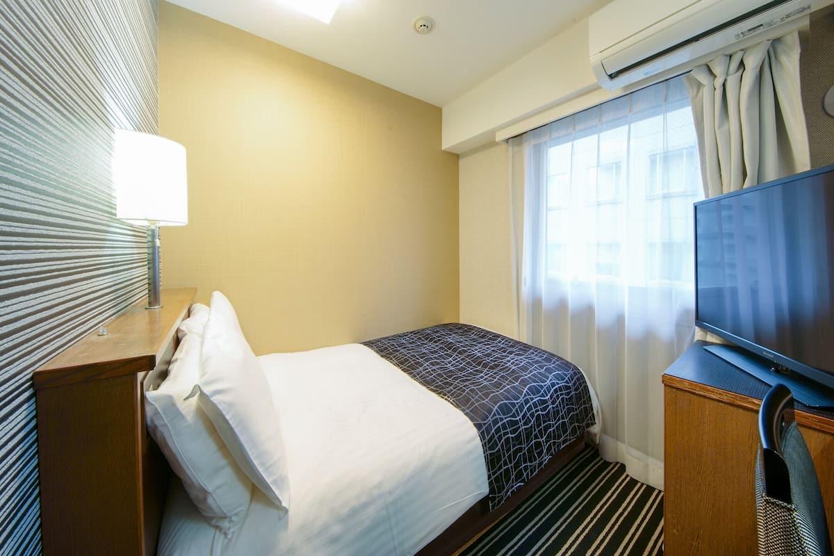 Desk, blackout curtains, iron/ironing board, WiFi