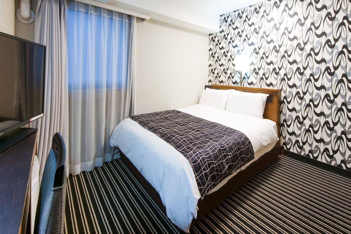 Desk, blackout curtains, iron/ironing board, WiFi