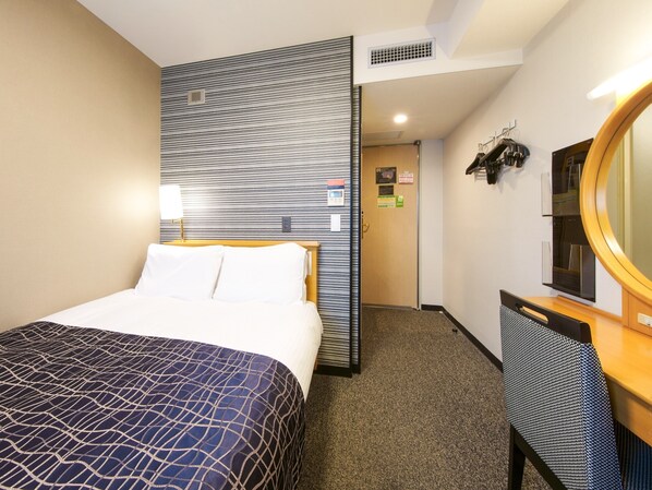 Desk, blackout curtains, free WiFi, bed sheets