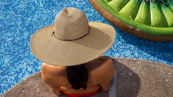 2 outdoor pools, open 9:00 AM to 9:00 PM, pool loungers