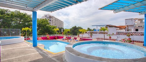 2 outdoor pools, open 9:00 AM to 9:00 PM, pool loungers