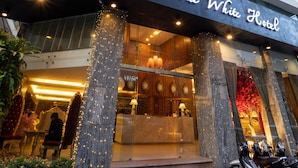 The White Hotel with a modern facade, large windows, and a prominent entrance with steps and a covered area. - The White Hotel 8A Thai Van Lung (Ho Chi Minh City)